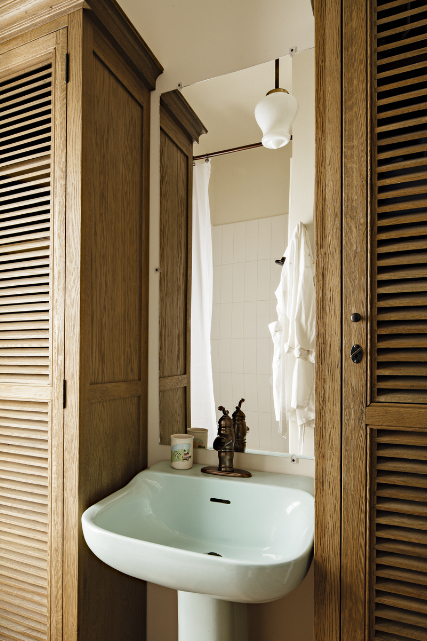 Vicki Simon Interior Design - rustic bathroom with blue sink